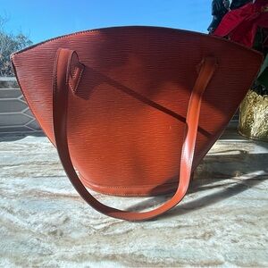 Louis Vuitton Saint Jacques in brown Epi leather bag.